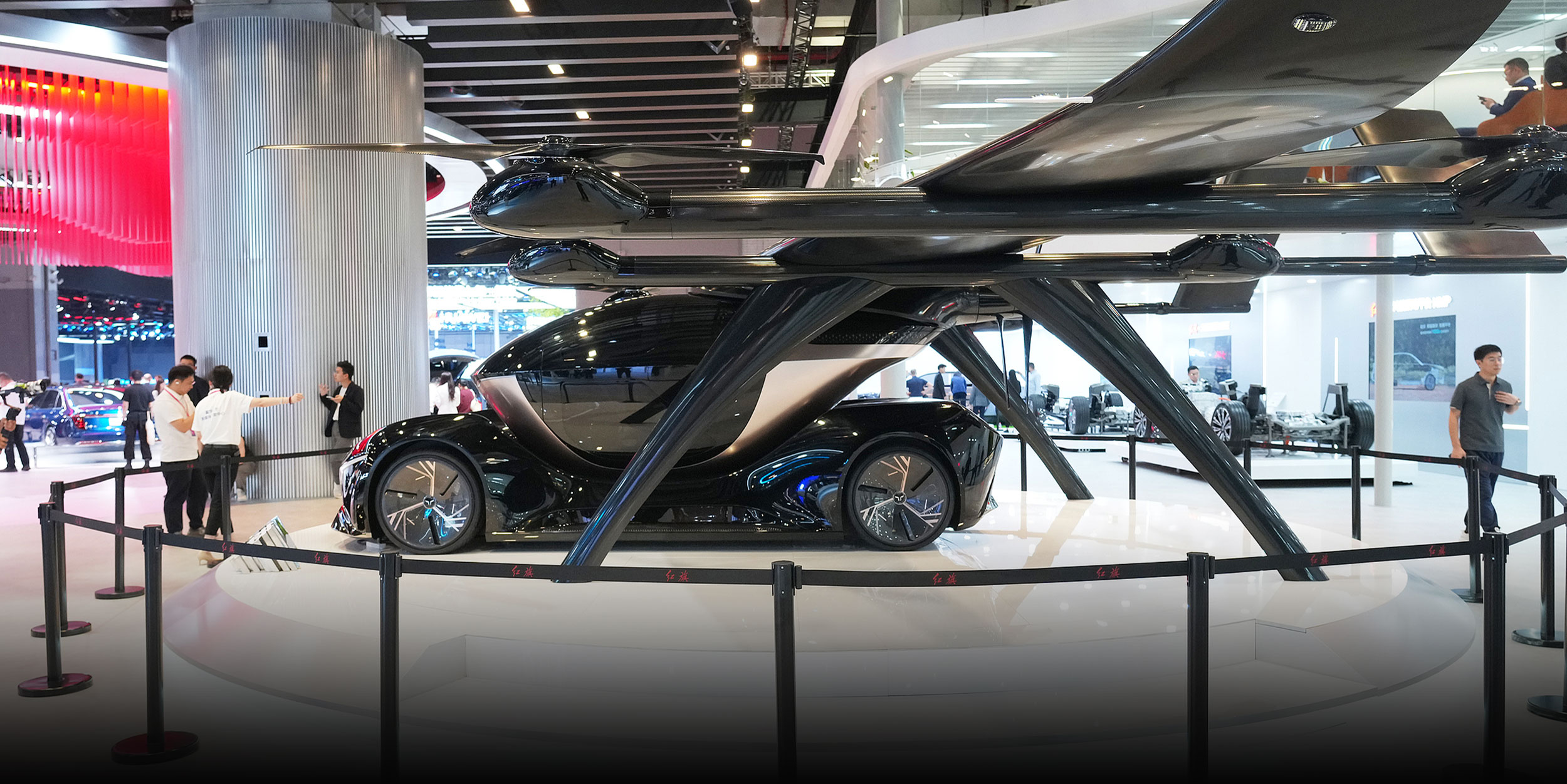 Auto Shanghai: Carmakers Push Past EVs With Flying Cars, Robots