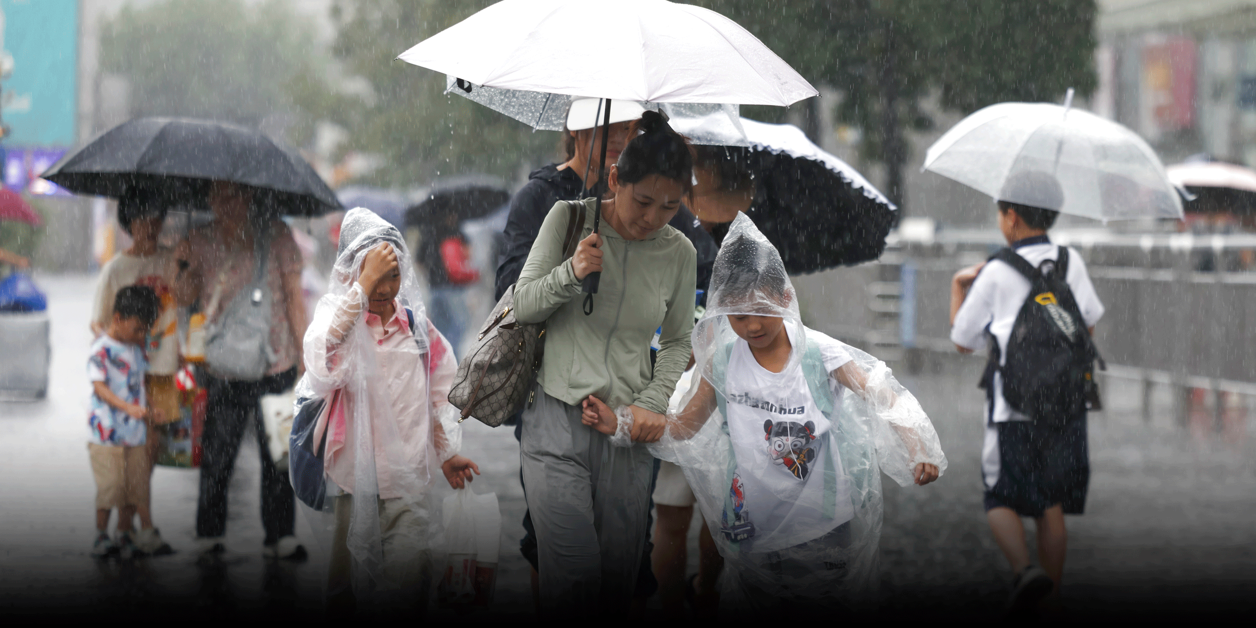Storm Co-May Slams Shanghai, Grounds Flights, Floods Streets