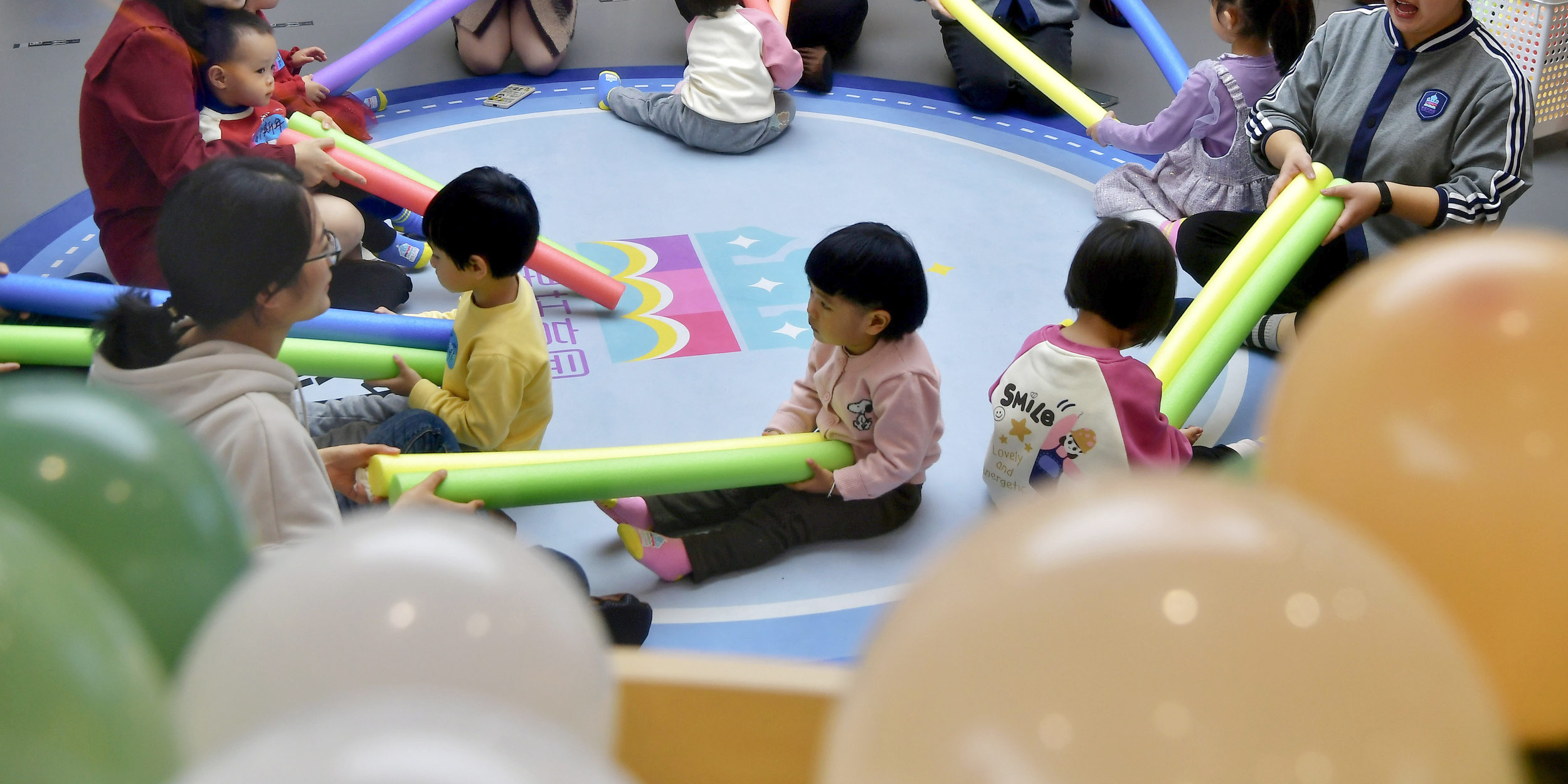 China Unveils Draft Law to Expand Childcare Services